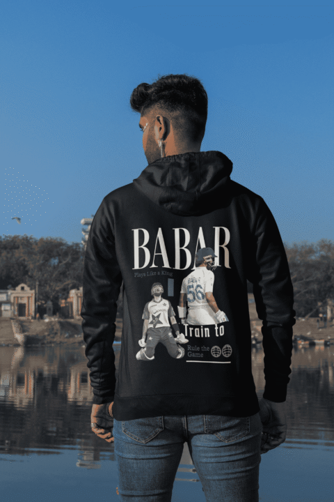 back-view-gildan-hoodie-mockup-of-a-man-standing-by-a-lake-m39271 (1) Babar Azam Premium Hoodie – A Perfect Choice for Cricket Fans – Flat 35% OFF!