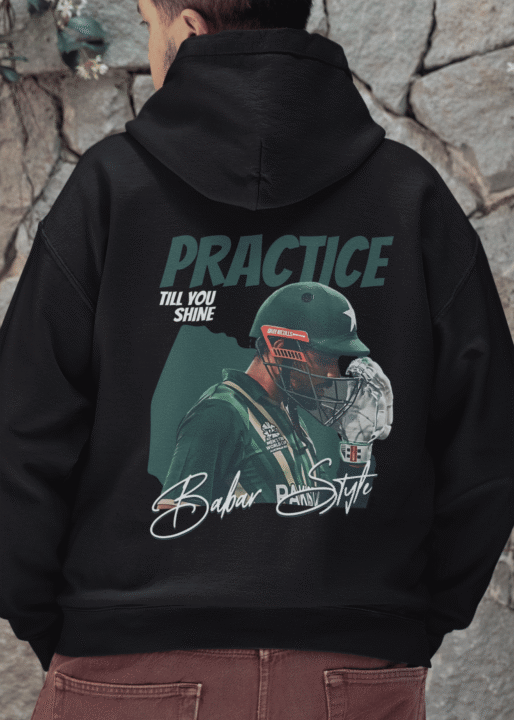 back-view-hoodie-mockup-featuring-a-person-standing-in-front-of-a-rock-wall-m39867